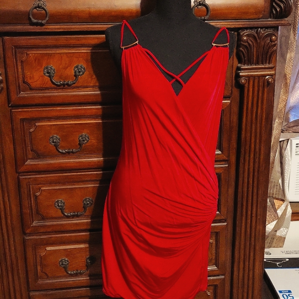 Red crisscross front style dress with roughing.